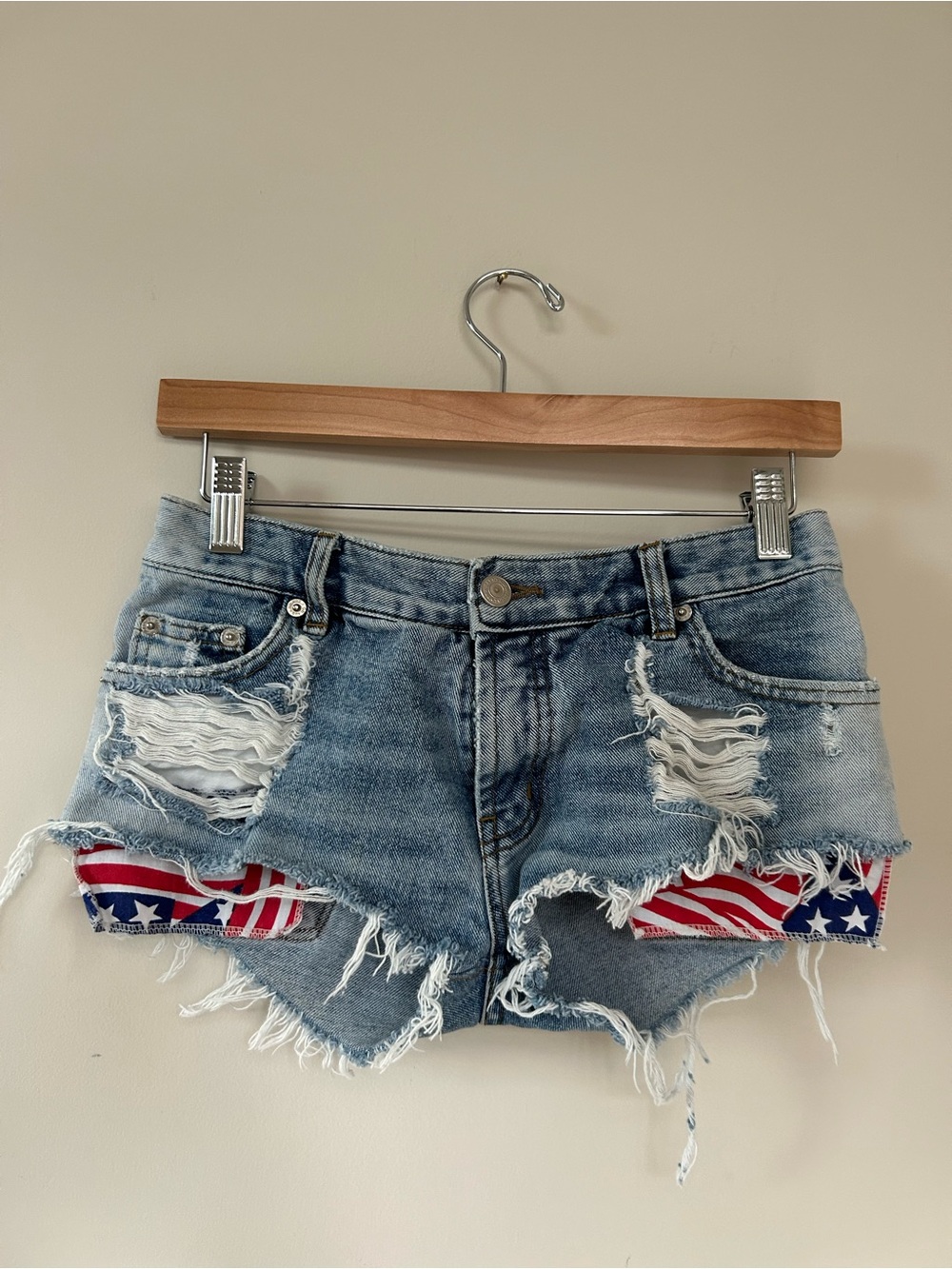 Distressed Blue Denim Women's Cutoff Shorts with Stars & Stripes Lining